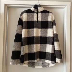 Black and White Boxercraft checkered fleeced quarter zip jacket.